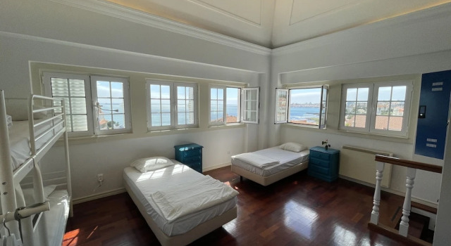 Кровать в общем номере (женский номер) рядом с пляжем Impact Beach House