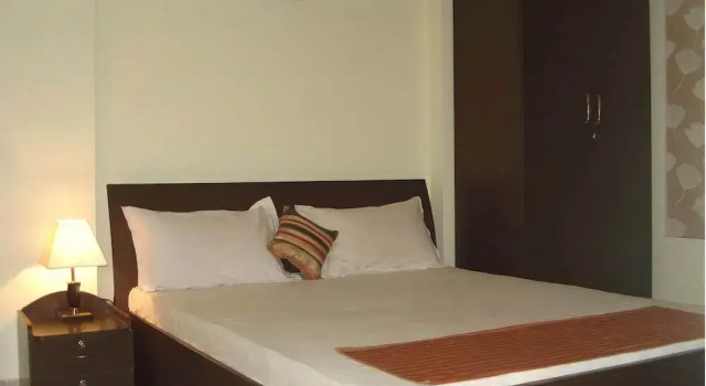 10 Blossoms Service Apartment, Rezervovat Apartmán Apartmány v Gujarat, Apartmán
