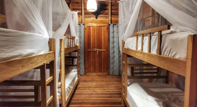 Кровать в общем номере La Finca Lorena Tayrona