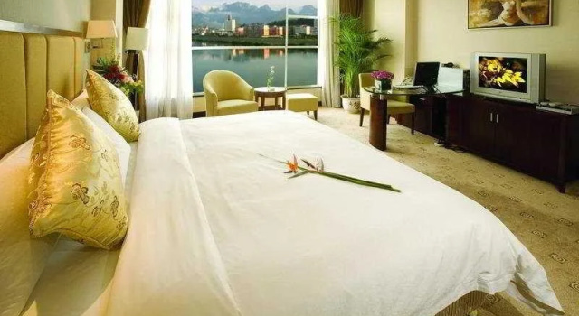 Yichen International Hotel, Varaa Hotelli Huangpu 
