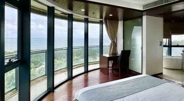 Люкс с 3 комнатами с видом на море Qionghai Yifang Apartment