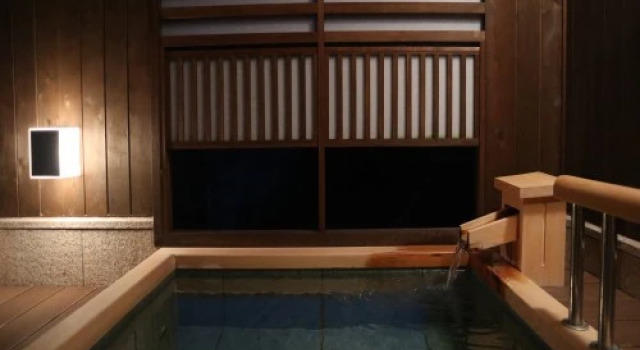 Кровать в общем номере Izukogen Onsen E Kokochiyado Kazeyobi