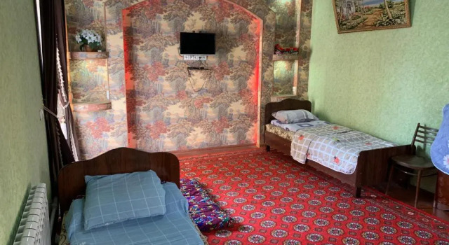 Económica quarto Muharram Homestay in the neighborhood of the Registan Square, 家族 ゲストハウス