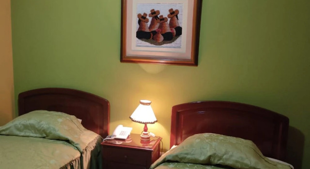 Habitación triple Estándar Hostal Monumental