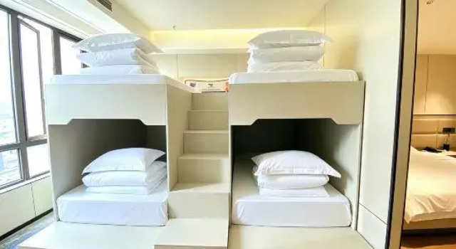 Кровать в общем номере Chongqing Qijiang Wanda Art Racing Space E-Sports Hotel (Aegean Shopping Center)