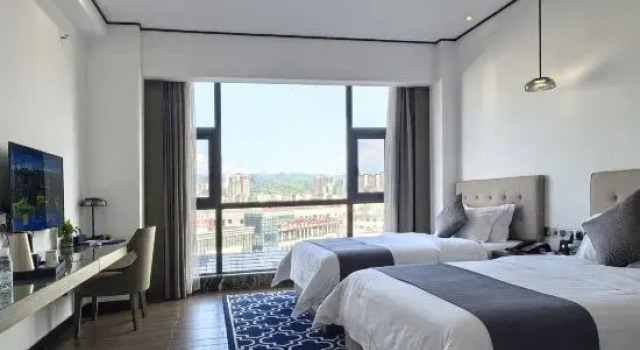 Семейный люкс с 2 комнатами Wanfenglin Baihua Hotel