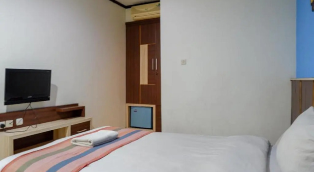 Habitación doble De lujo Pineapple Mansion Solo Mitra RedDoorz near RS JIH Solo