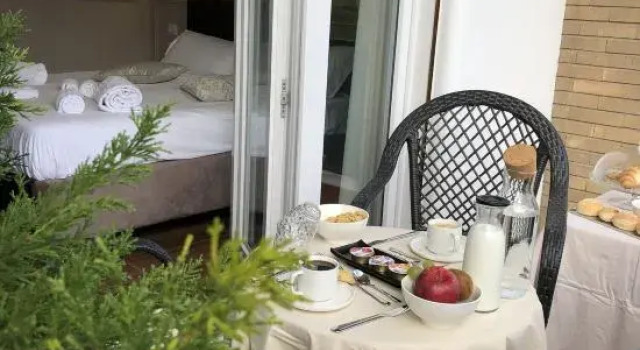 Двухместный люкс Deluxe с балконом Unicum Roma Suites