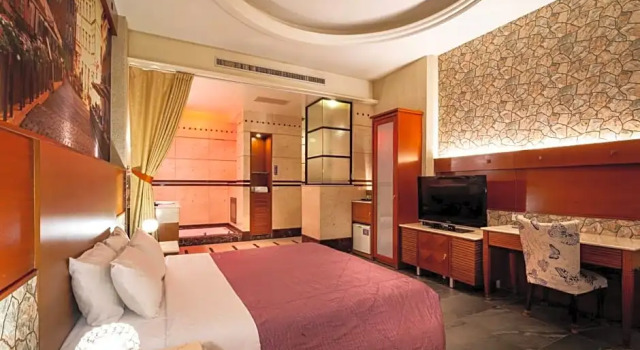 Номер Deluxe 國妃鷹堡時尚健康館King & Princess Motel