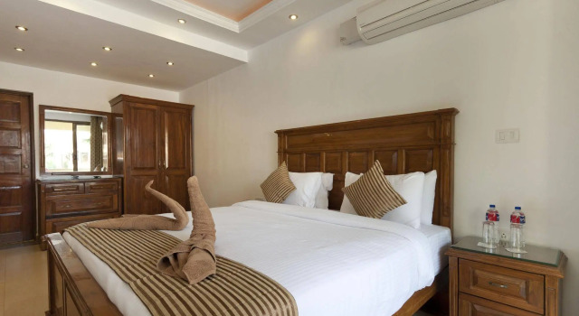 De Mandarin Beach Resort Suites & Villas, Candolim, Забронировать Курортный отель Кандолим Северный Гоа