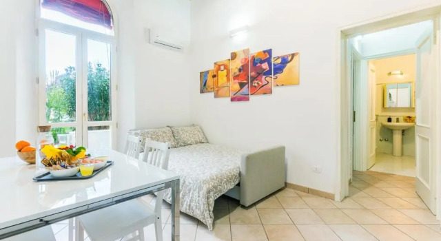 Апартаменты c 1 комнатой University Apartment con parcheggio e giardino