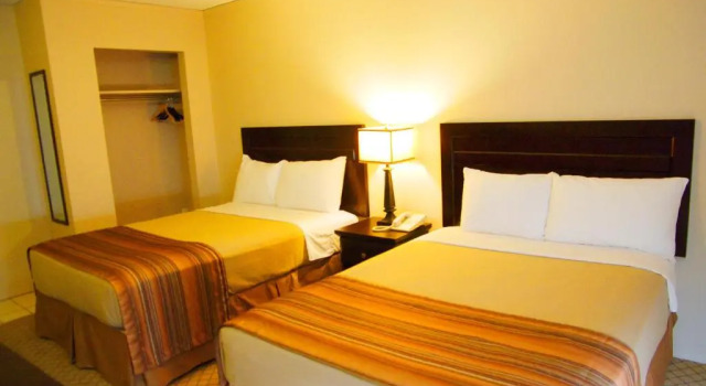 Standard Vierer Zimmer Airport Travellers Inn
