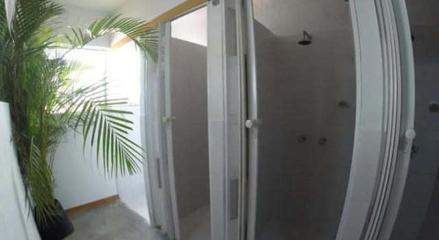 Кровать в общем номере Hostal Casa Estación