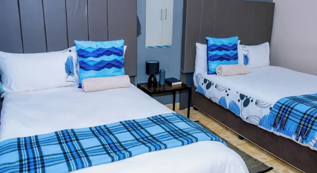 Standard Twin room with garden view Abenab Lodge & Tours cc