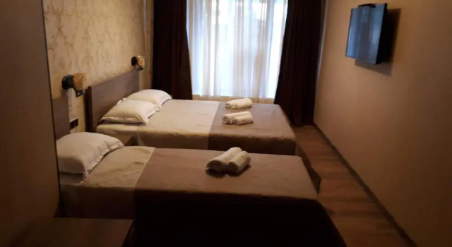 Трёхместный номер Comfort House Lia