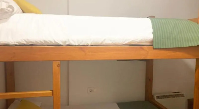 Кровать в общем номере с балконом Apartamentos Sabica Nevada Plaza