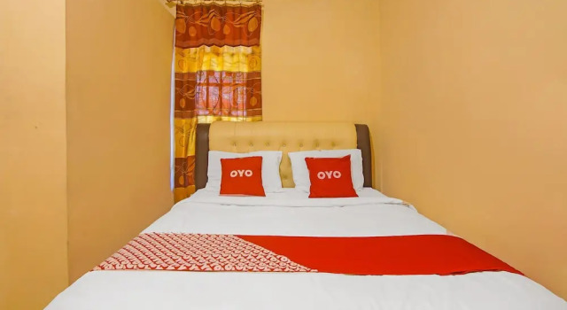 Harland Guesthouse by OYO Rooms, Rezerwuj Hotel Padang Sumatra