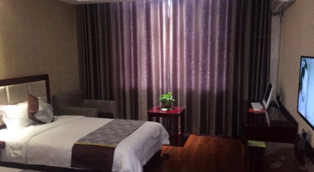 GreenTree Inn Gansu Jiuquan Guazhou Zhangzhi Park Express Hotel, Book Hotel Hotels in Jiuquan with Parking, Parking