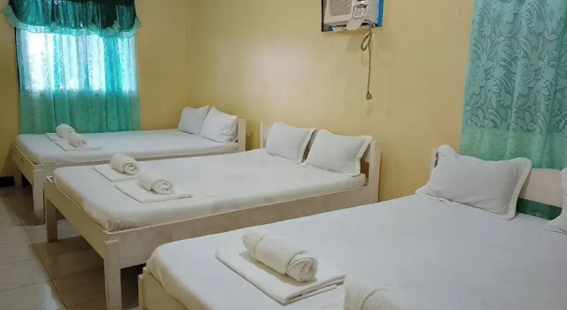 Коттедж Julys Haven Seaside Pension Camiguin
