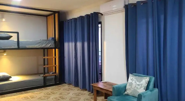 Кровать в общем номере Hostal Backpackers Travelero