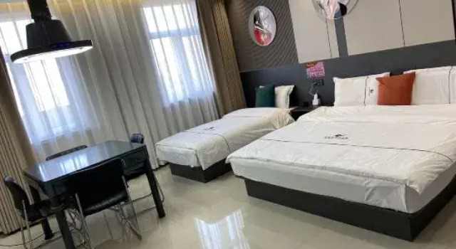 Люкс Qitaihe Jinwowo Fashion Hotel