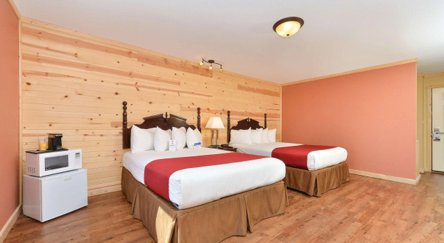 Четырёхместный номер Standard Americas Best Value Inn Wall