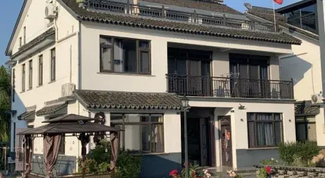 Zhouzhuang Misty Rain Jiangnan Homestay, Book Hotel Hoteller i Jiangsu med parkering, Parkering