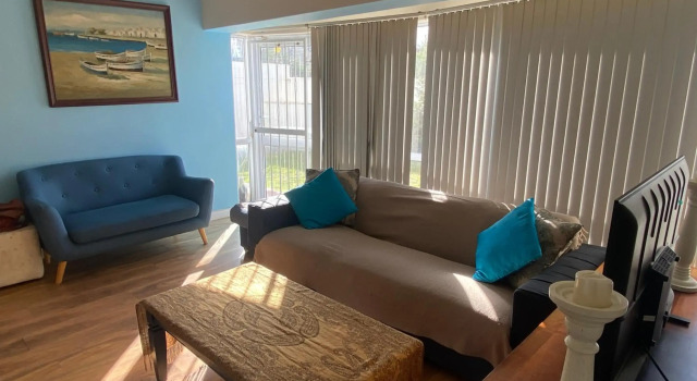 Cozy two bedroom unit in Strand with pool gym and laundromat
