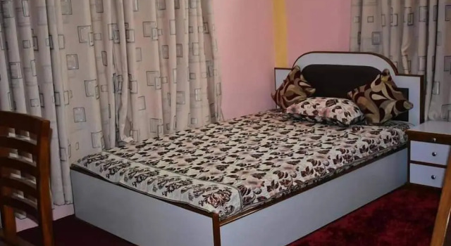 Кровать в общем номере Golden heaven homestay