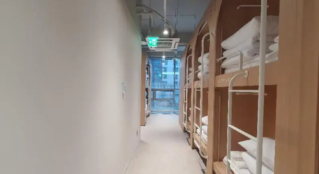Кровать в общем номере Haeundae Marine Capsule Hotel&Spa