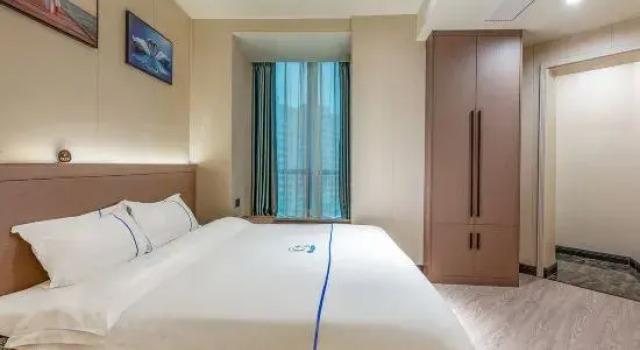 Люкс Deluxe с 2 комнатами Yiyuehong Hotel (Minnan Shuixiang Branch)