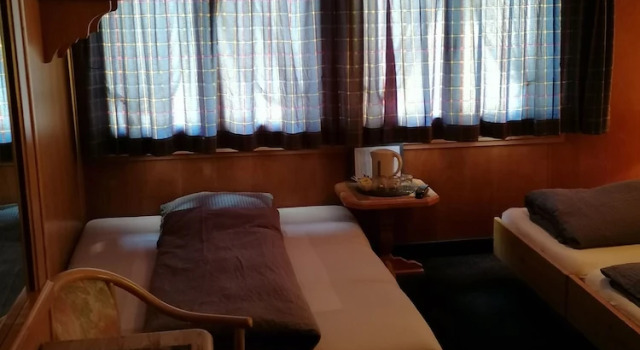 Трёхместный номер Petit Helvetia Budget Hotel