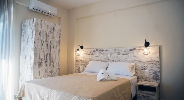 Апартаменты Sinodinos Deluxe Apartments
