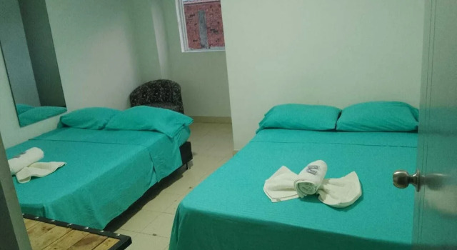 Кровать в общем номере Hotel Bayadera Real