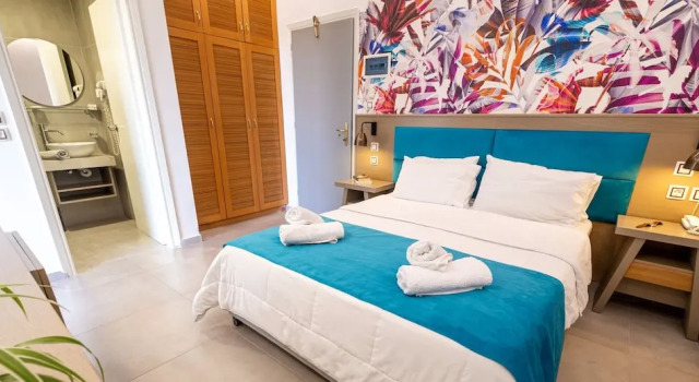 Четырёхместный семейный номер Standard с балконом и с видом на сад May Beach Hotel