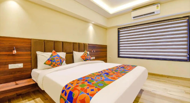 Номер Deluxe Fabhotel Prime Pink City Park