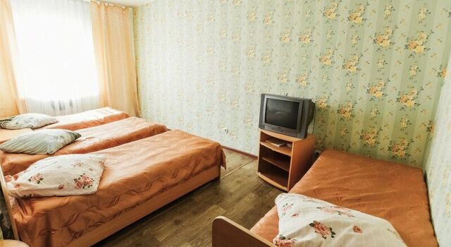 Кровать в общем номере Городок