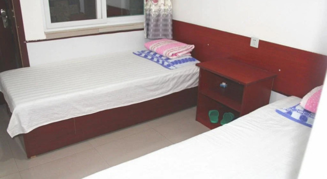 Hongbin Family Inn, Book Hotel Hoteller i Huludao med parkering, Parkering
