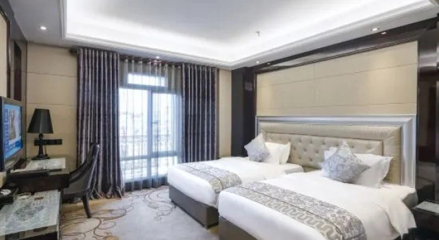 Четырёхместный семейный люкс Shanhai Hotel