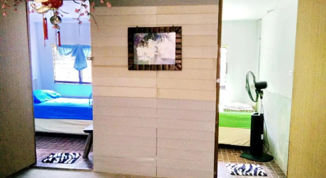 Кровать в общем номере Tuk Tuk Guesthouse