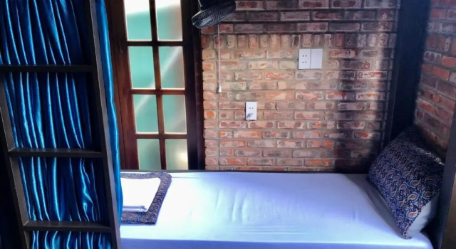 Кровать в общем номере Calm House Hotel Hoi An 1