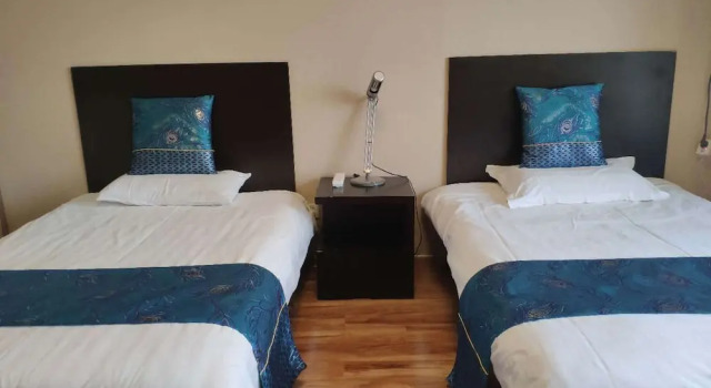 Четырёхместный номер Standard Tiandi Huadian Apartment Boya