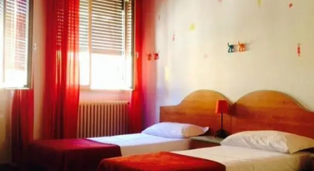 Кровать в общем номере Hotel Galla