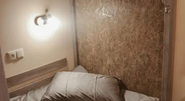 Pat în dormitor Hostel Hanza