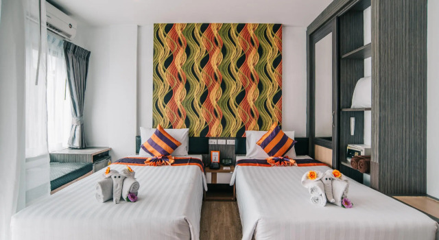 Кровать в общем номере iCheck inn Chill Patong