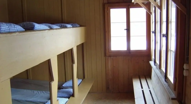 Кровать в общем номере Gasthof Rosegg