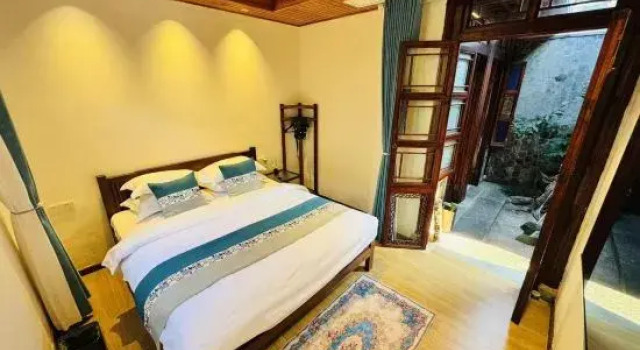 Кровать в общем номере Yangzhou Yanju Sanyue Homestay (Heyuan)