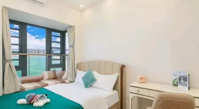 Семейный люкс с 2 комнатами с балконом Yiduo Scenic Apartment (Danzhou Ocean Flower Island)