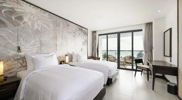 Двухместный номер Deluxe с балконом и oceanfront Emerald Ho Tram Resort