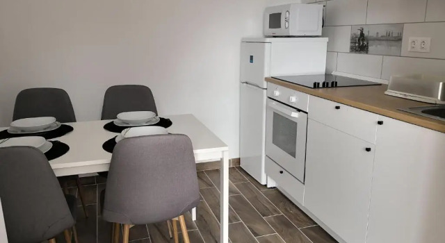 Апартаменты Цокольный этаж с 2 комнатами Green Garden Plus Apartman